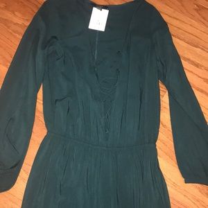 dark green jump suit